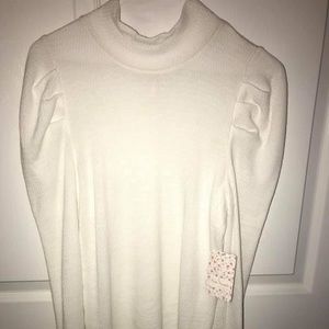 Free people long sleeve with ruffles. Never worn.